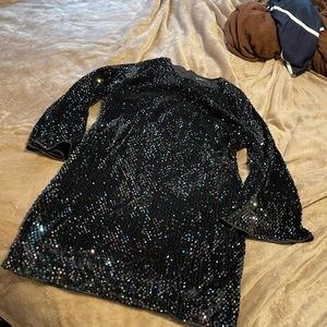 Sequin dress. Mid thigh length